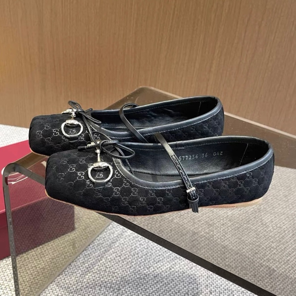 Gucci Black Flats with Silver Buckle